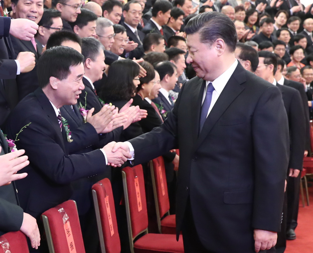 2018年1月8日，張國良榮獲國家科技進步一等獎,習近平總書記與張國良握手照片